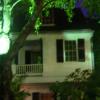 This photo was taken at the Audubon House and Gardens in Key West around 10:00pm. Notice the figure standing on the porch. Could this be the wife of Captain Geiger, the ship Captain who built the home, or Captain Geiger himself? Several of their 9 children died in the home of yellow fever. 